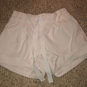 white lululemon shorts